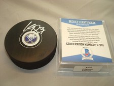 Kyle Okposo Signed Buffalo Sabres Hockey Puck Autographed Beckett BAS COA 1B