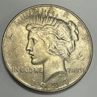 1934 Peace Silver Dollar Choice AU+.
