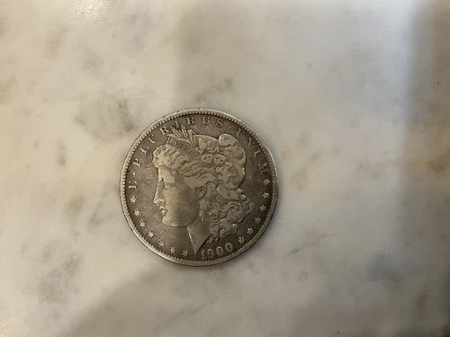 1900-O Morgan Dollar – Ungraded – Estimated Fine(F) Condition – New Orleans Mint