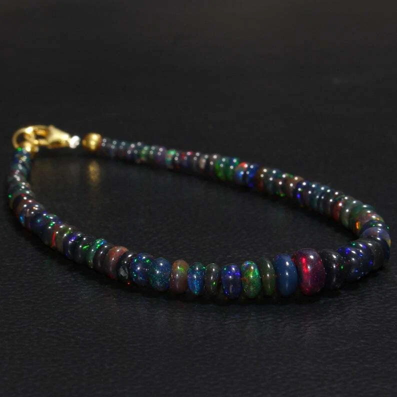 Brazalete de piedras preciosas con cuentas rondelle lisas de ópalo de fuego negro etíope natural de 3-5 mm Foto 3 de 4