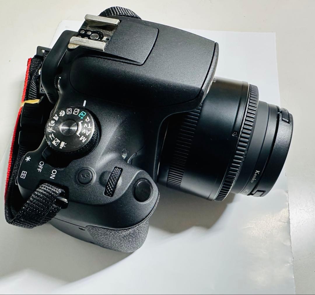 Canon EOS Kiss X90 DSLR Camera with YONGNUO 50mm F1.8 Lens and 