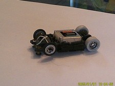 VINTAGE AURORA TYPE TYCO CHASSIS RUNS PERFECT HO SLOT CAR