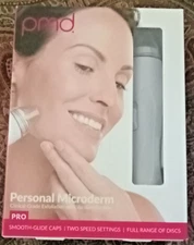 pmd Personal Microderm PRO electric white with green and red replacement disks