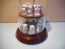 WOODEN & GLASS DOMED 15 THIMBLE HOLDER WITH ROYAL WORCESTER CHINA THIMBLES
