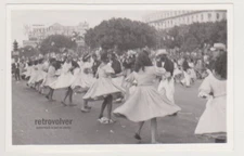 Dancers Twirl as Dresses Fly Energy Fills the Air at Lively Street Dance Party