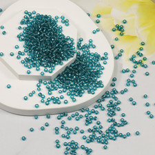 Peacock Blue Sliver Lined Color Size 3mm Seed Beads About 3600pcs/100Grams in Ba