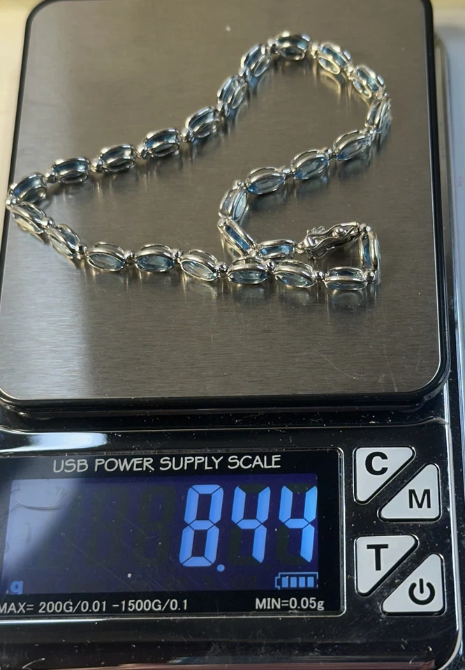 Oro blanco 14k con topacio azul 8,5 pulgadas 5 carros Foto 4 de 4