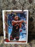 2025-26 Topps Holiday Jonathan Mogbo #H23 Toronto Raptors Base