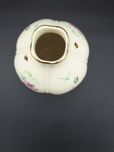 White round LENOX MORNINGSIDE vase with gold rim, dragonfly and bee motifs, and purple fabric design on dark background.
