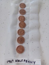 A set of 7 1967 Halfpenny coins in uncirculated condition