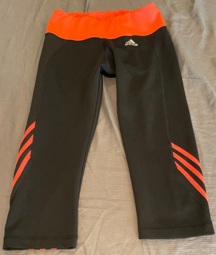 Women Adidas Black/Orange tights.  Size M