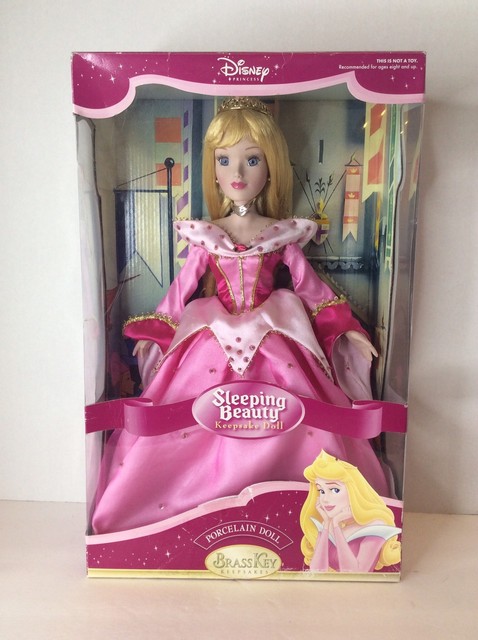 brass key keepsake disney porcelain dolls