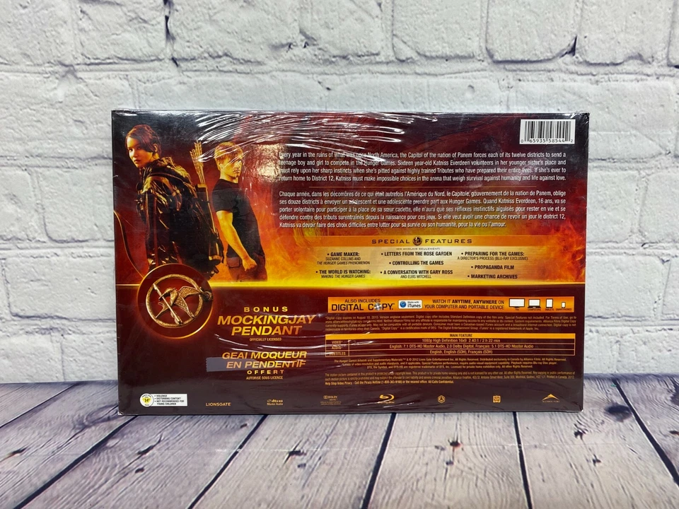 The Hunger Games Movie Blu Ray Walmart Exclusive with Mocking Jay Pendant New - Image 2 of 4