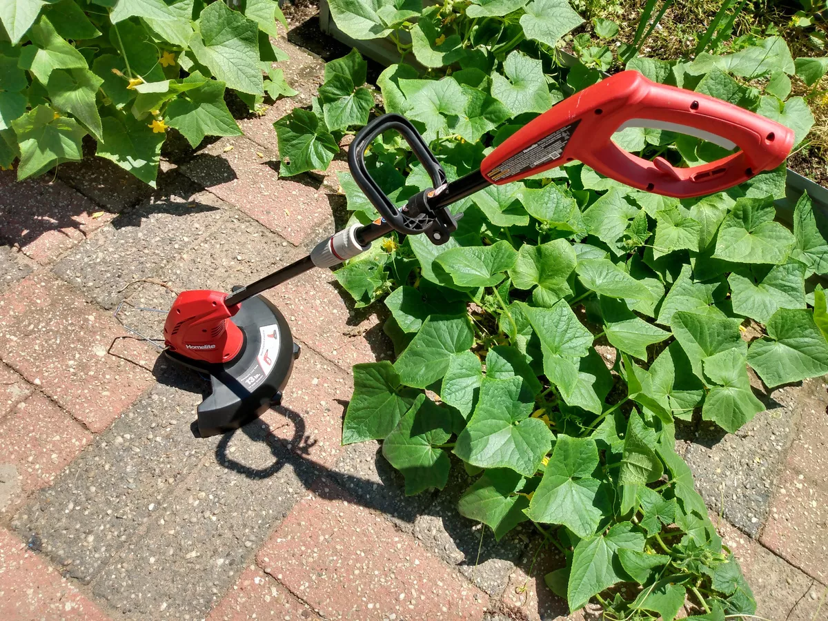 Homelite 13 in. 4 Amp Straight Electric String Trimmer Adjustable