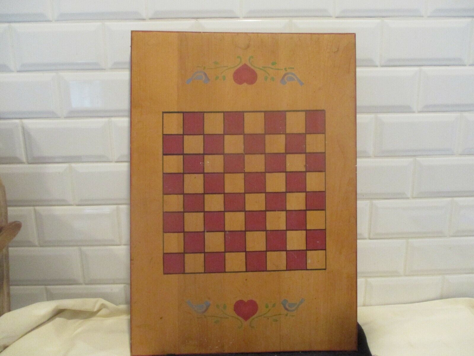Vintage wood handmade checkerboard. Hearts/birds