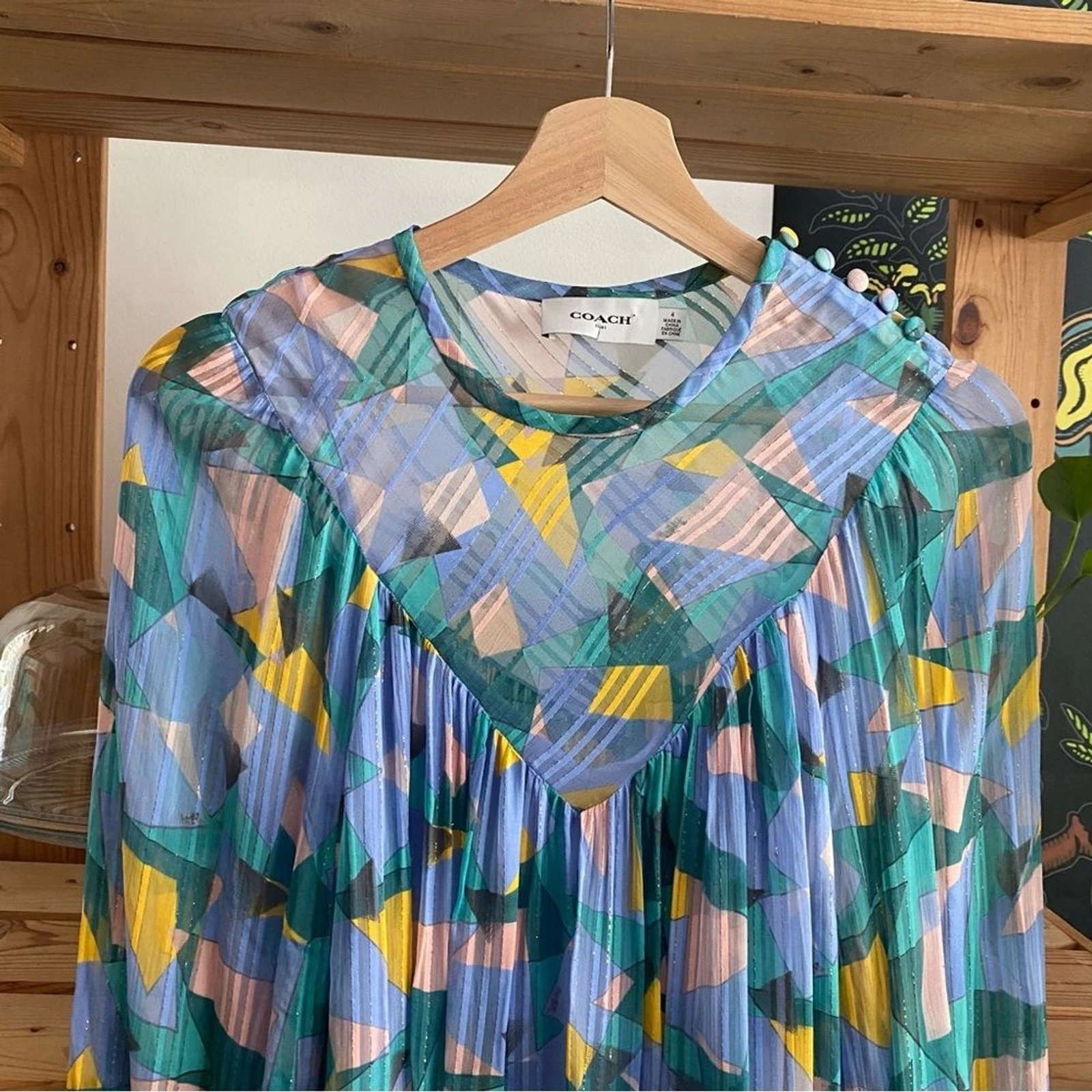 Mini abito Coach colorato audace Geo Yoke manica lunga