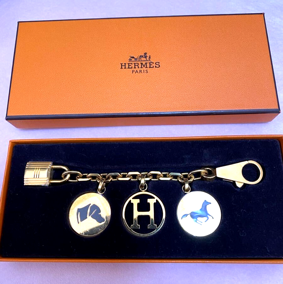 Hermes Breloque Gold Bag Charm Amulette 4 Rock dog hose H Cadena