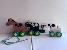 Melissa  Doug Wooden Stacking Farm Animals Pull Along Toy Horse Cow Sheep