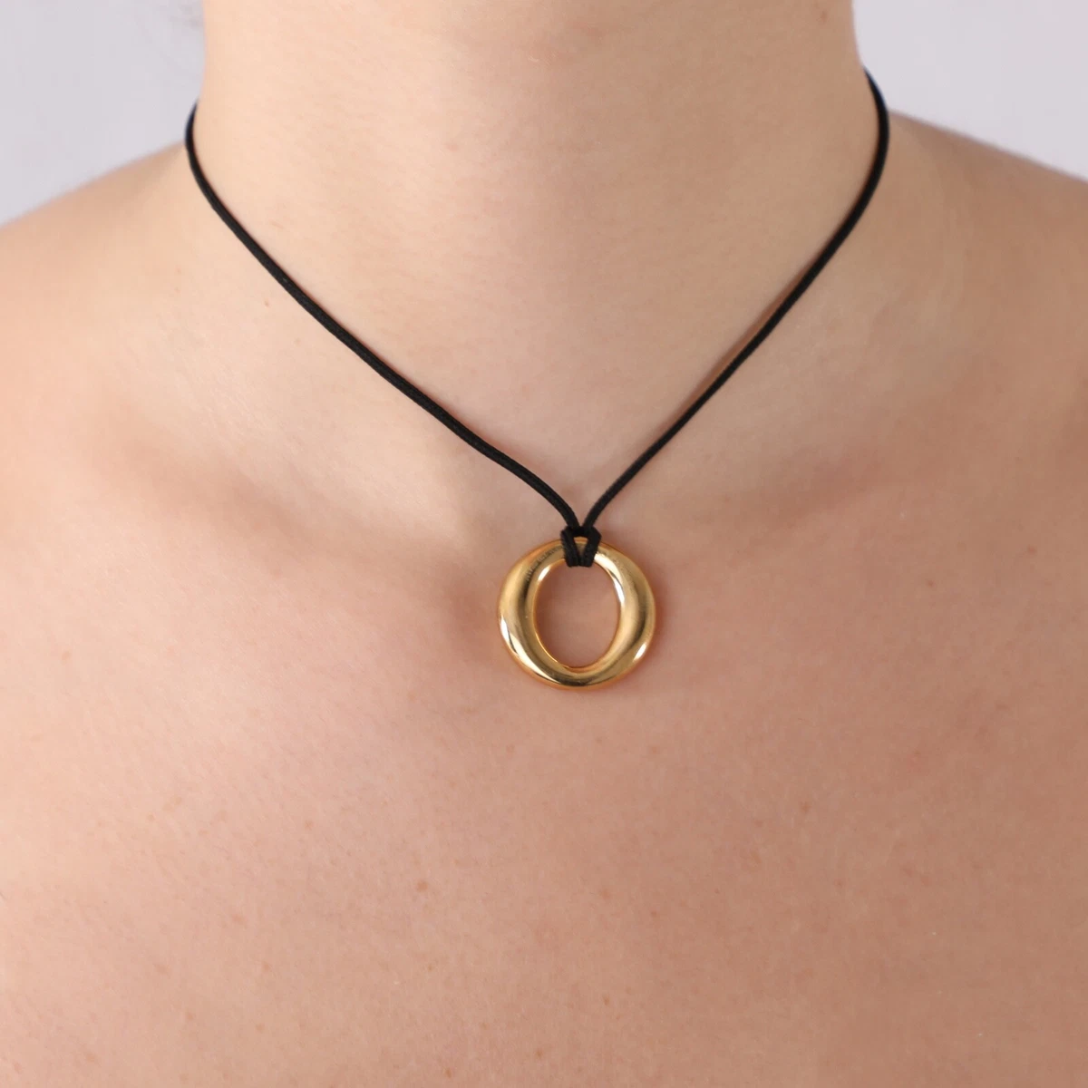 Elsa Peretti® Sevillana™ pendant in 18k gold with a silk cord, small.