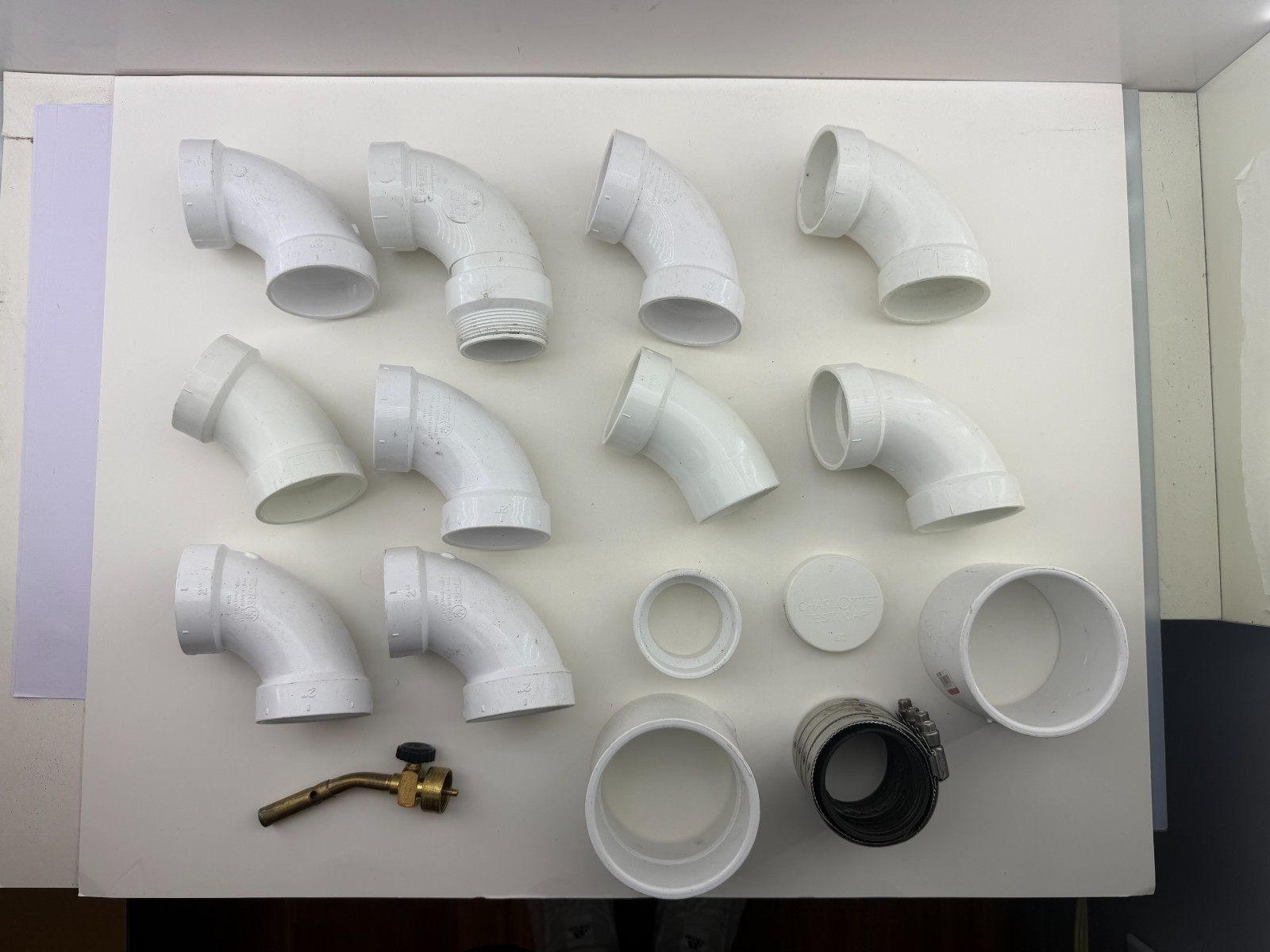 PVC PLUMBING PARTS LOT  16 PIECES PIPES, CAP, ETC