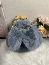 Luxurious faux fur bunny bag, chic and cozy accessory for stylish outings.