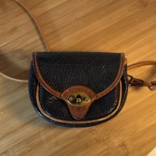 Vintage Dooney  Bourke Pebble Black Brown Leather Trim Crossbody W/Belt flap.