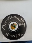 BOBBY HULL SIGNED HOCKEY PUCK CHICAGO BLACK HAWKS INCLUDES COA AND PUCK HOLDER. — photo 1