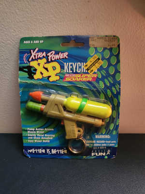 Vintage Super Soaker XP Squirt Gun Keychain. 1996 Basic Fun / Larami. Sealed
