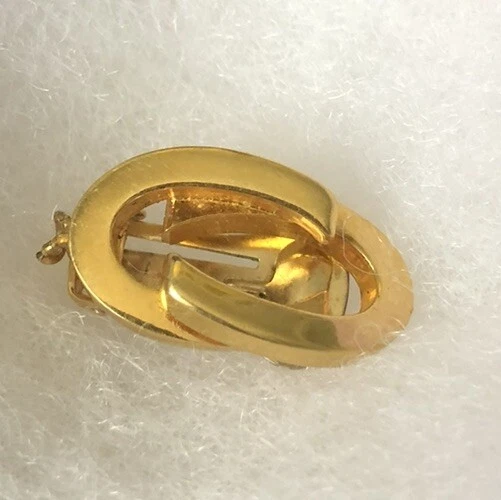 Boucles d'oreilles vintage Gucci ton or à clipser (1) uniquement