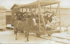 RPPC of a Horse Powered Simple Wood Trolley Car Loaded with People c1910-15