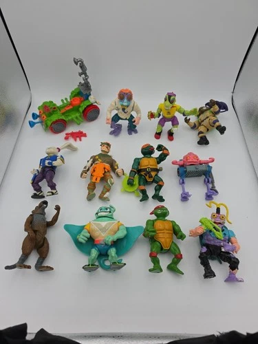 Vintage TMNT Action Figure Lot Of 11 Figures And 1 Vehicle.