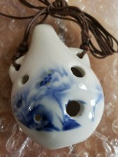 6 holds Portable ceramic ocarina white with flower