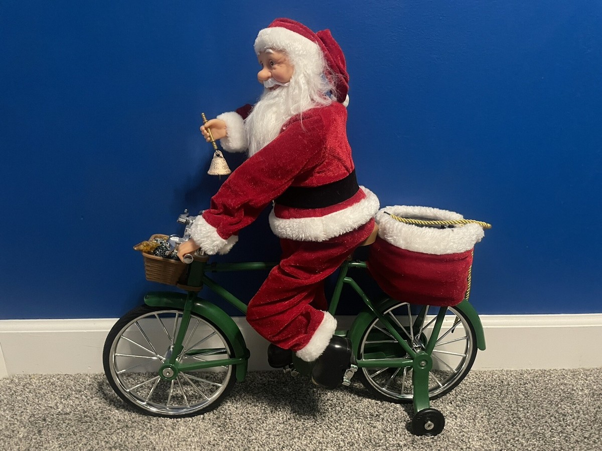 Christmas Battery-Operated Santa Claus Riding On Bicycle (No Batteries)