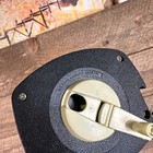 Black vintage Stanley 50 foot hand crank with brass jaw, white faceplate, and engraved brand name on textured grip.