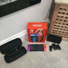 Nintendo Switch OLED Red And Purple Joycons