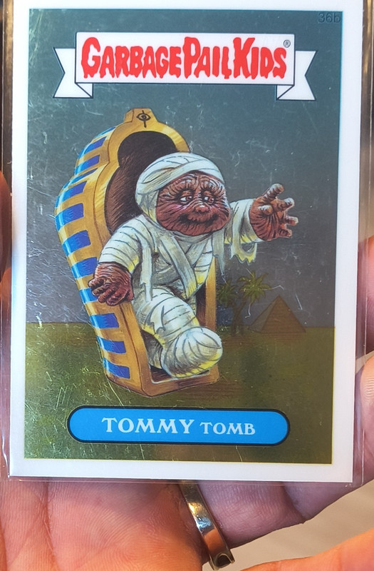 Topps 2013 Garbage Pail Kids Busy-Bod(y) License Tommy Tomb #36b Sticker