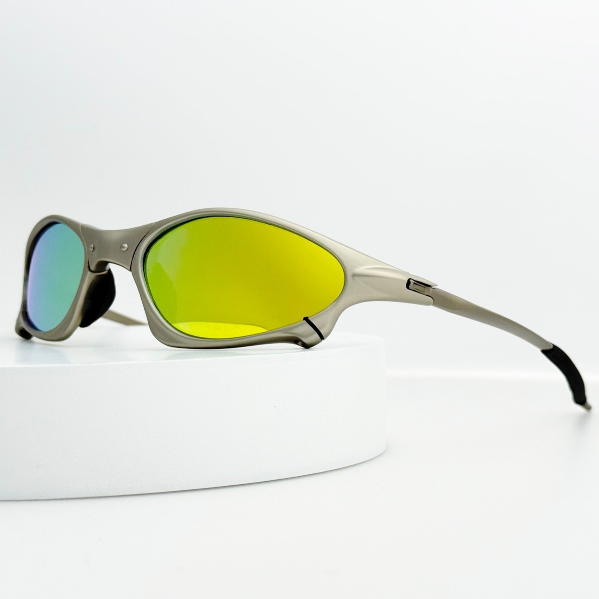 Oakley Penny X-Metal Sunglasses Silver Frame Yellow Iridium Lens