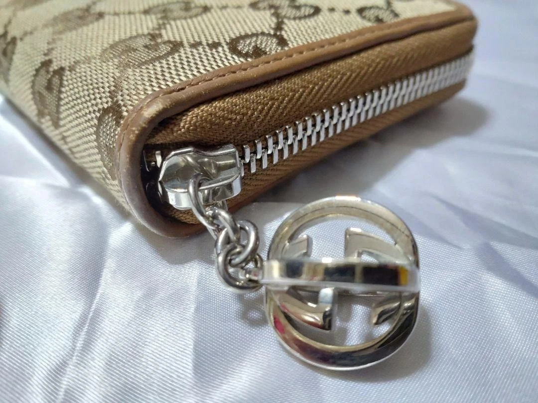 Portefeuille long GUCCI neuf GUCCI rond fermeture éclair GG toile cuir GG jumeaux