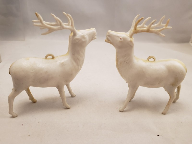 2 Vintage Hard Plastic Christmas Tree Reindeer Ornaments