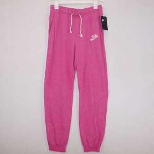 nike women's sportswear gym vintage distressed pants