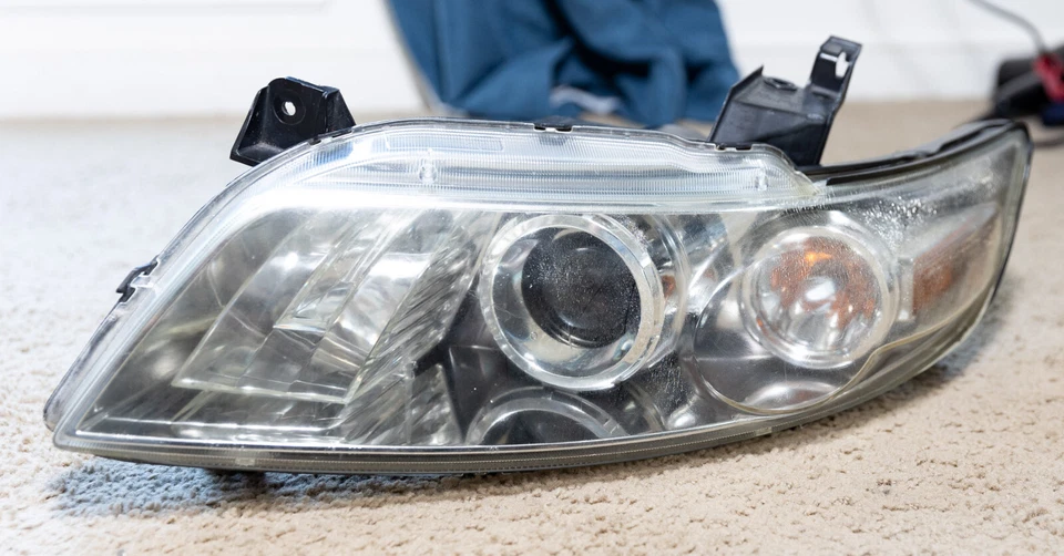 Faro lateral izquierdo Infiniti FX35 FX45 2004-2008 OEM LH xenón HID sin pestañas rotas Foto 2 de 4