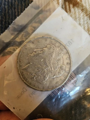 1889 $1 Morgan Silver Dollar VF, in clear APMEX bag.