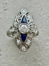 Art Deco Filigree Cocktail Ring with Old European Cut Diamonds and Sapphire Accents