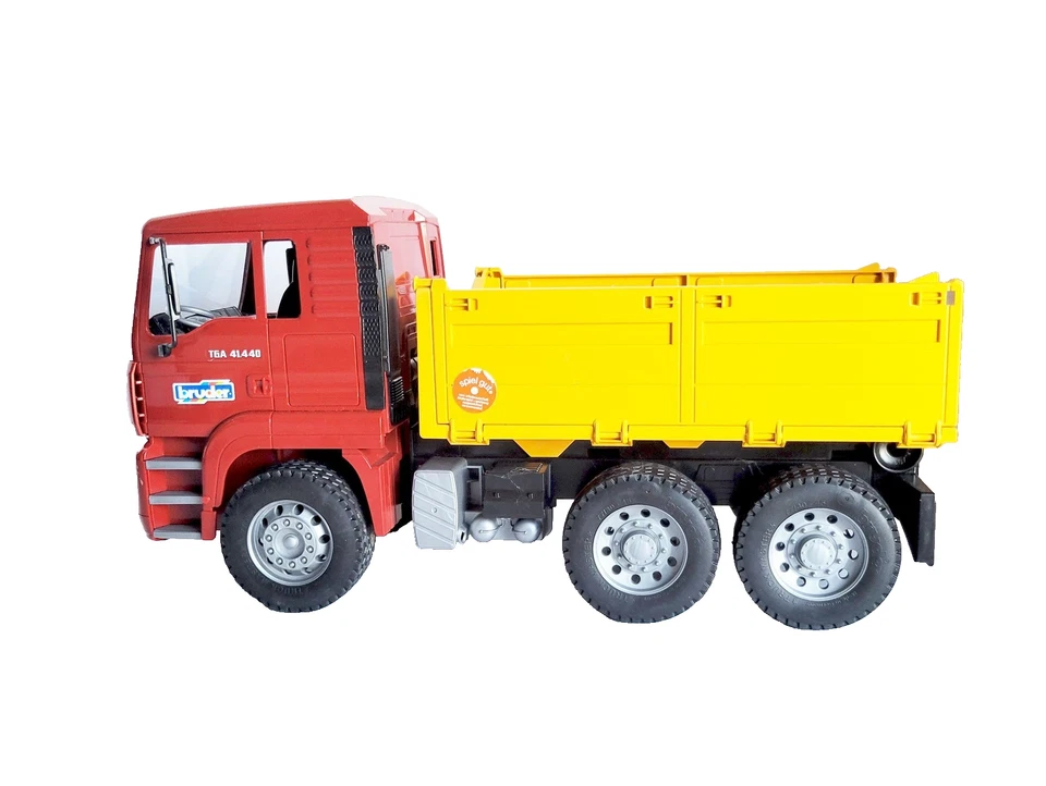 Camión de volteo Bruder Man rojo amarillo construcción hecho en Alemania Foto 2 de 4