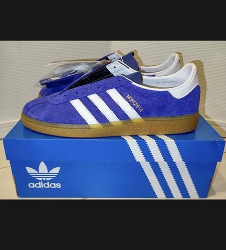 blue and white adidas munchen