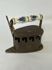 ANTIQUE / VINTAGE BRASS AND CERAMIC HANDLE COAL IRON - 7 INCH LENGTH