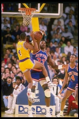 Center Patrick Ewing New York Knicks blocks the shot of guard Byro- Old Photo