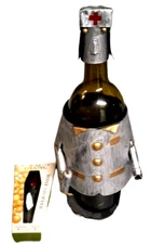 Handmade wine bottle holder, nurse uniform made out of metal, and new wine plug.