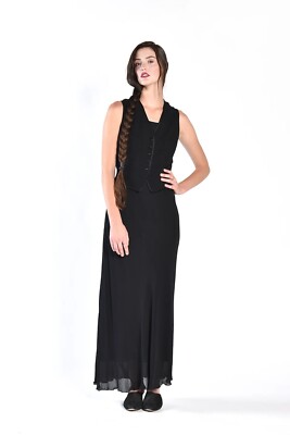 black vest maxi dress A black maxi dress is one of the most versatile dresses to have in your wardrobe. 1. Dress it up with a vest/waistcoat you got this summer 2. Pair it with any