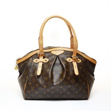 Authentic LOUIS VUITTON Monogram Tivoli GM, manufactured in 2012. Tote Bag B...